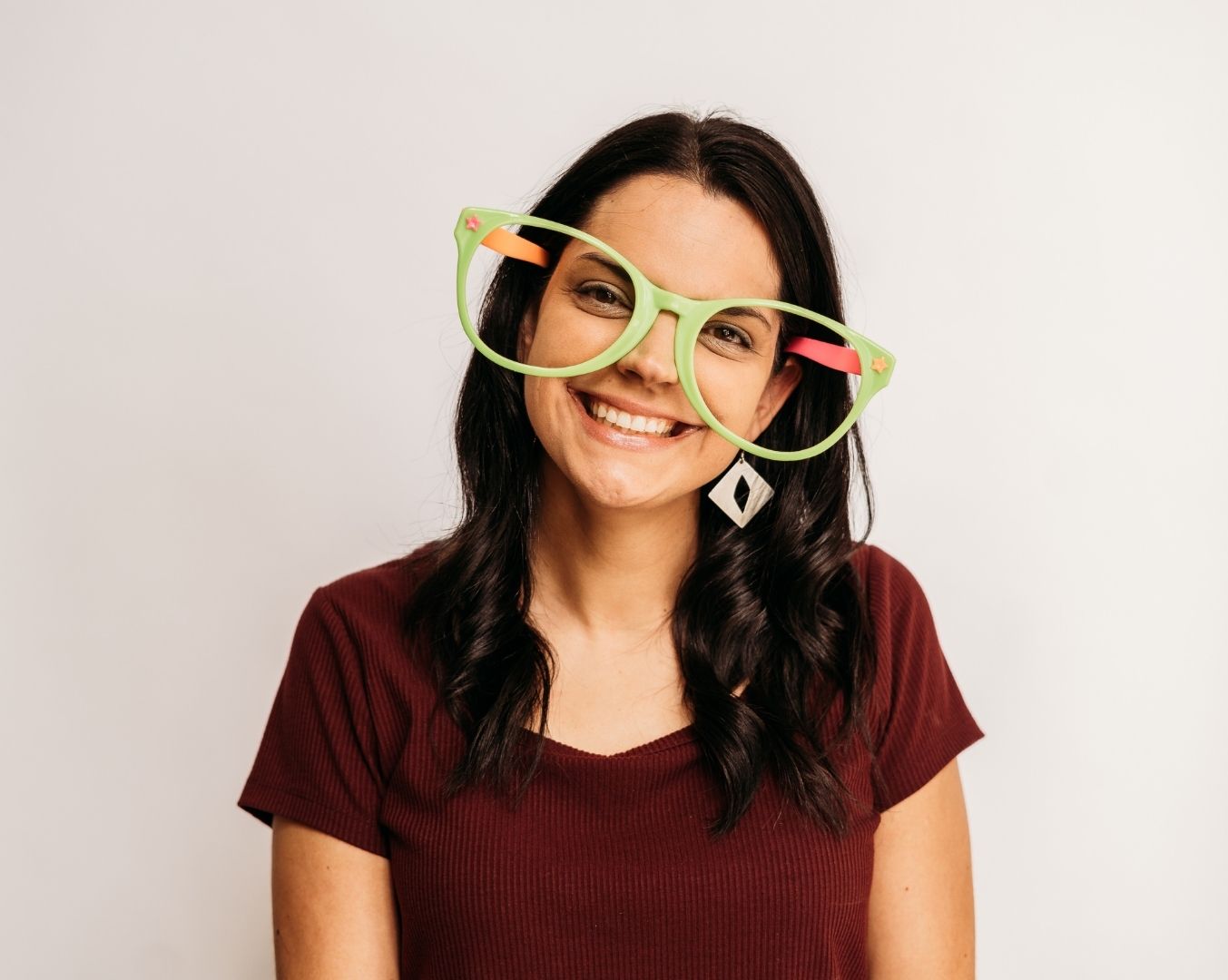 Young woman with oversized glasses on